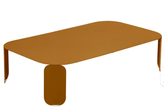 Fermob Bebop low outdoor table in gingerbread color, 120x70 cm with 42 cm height, featuring sleek modern design for outdoor use.