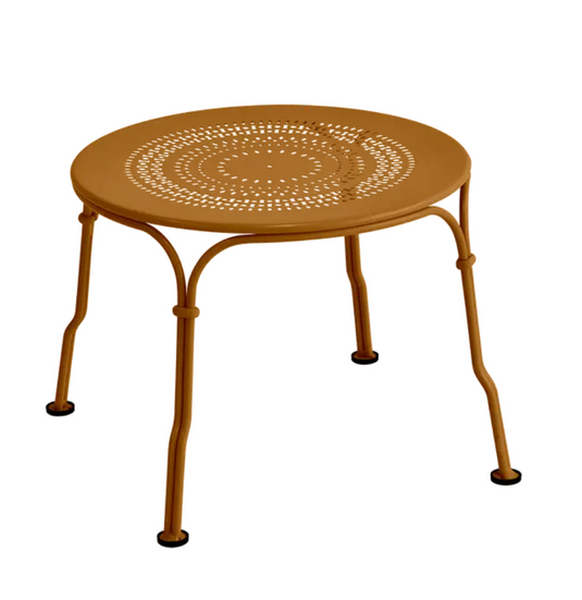 Fermob 1900 low table with a 45 cm diameter, round metal tabletop and sleek design, ideal for modern outdoor or indoor spaces.