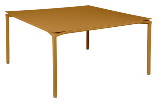 Fermob CALVI square dining table, 140x140 cm, eight-seater metal table with a modern design, ideal for outdoor dining spaces.