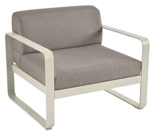 Grey Taupe Fermob Bellevie armchair with a cushioned seat and armrests, showcasing a modern metal design.