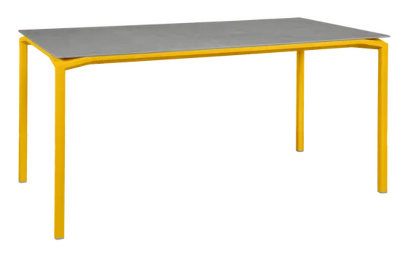 Load image into Gallery viewer, Fermob CALVI Creta Mineral dining table in honey grey with a 160x80 cm surface, six-seater for modern dining spaces.
