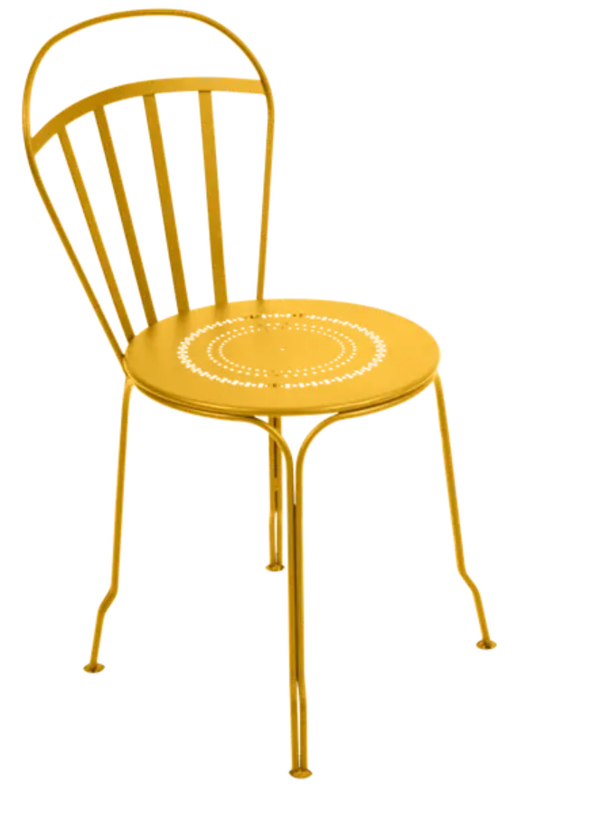 Load image into Gallery viewer, Fermob honey-colored outdoor LOUVRE chair with a stylish metal frame and slatted design, ideal for garden or patio use.
