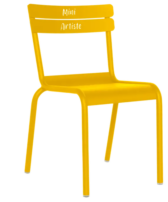 Honey-colored Fermob Luxembourg Kid Chair “Mini Artiste” by Custom Wood Designs, designed for children's cozy corner furniture.