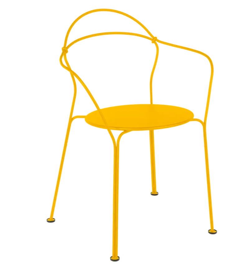 Load image into Gallery viewer, Fermob Honey Airloop Lounge Chair with metal frame, outdoor furniture style, showing a modern, curved armchair design.
