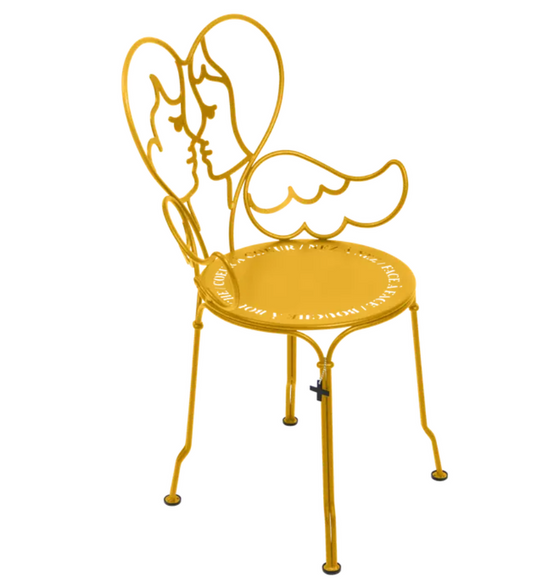 Fermob ANGE metal chair in honey color, outdoor furniture with a sleek, modern design and sturdy metal construction.