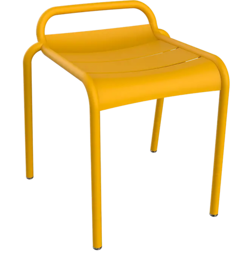 Load image into Gallery viewer, Fermob Luxembourg outdoor stool in honey color, modern design suitable for patio or garden seating.
