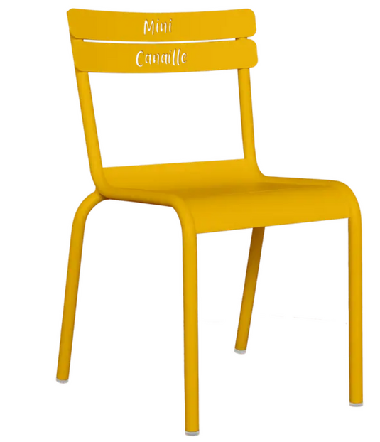 Fermob Luxembourg Kid Chair in honey color, small French furniture with a modern design, suitable for children.
