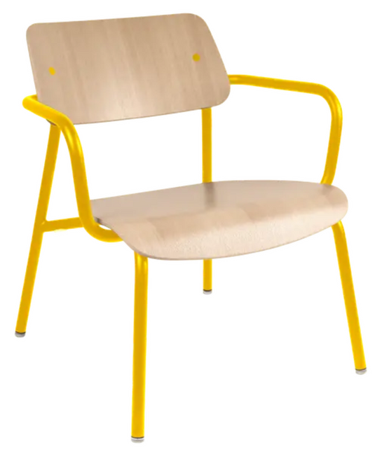 Honey-colored Fermob Studie oak lounge armchair with metal frame, suitable for office or living room decor.