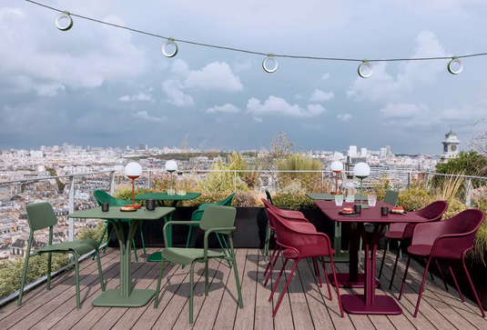 Fermob HOOPIK string lights outdoor lighting setup, 1200 cm length, ideal for restaurant or hotel outdoor ambiance.