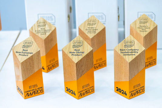 Custom Wood Designs award trophy made of wood with engraved inscription, designed for custom-made awards and recognition.