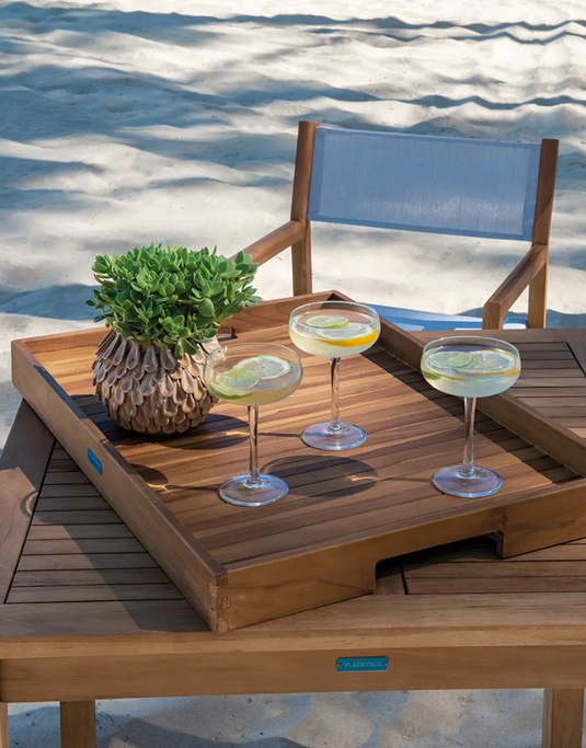 Fermob IBIZA serving tray made of solid teak wood, featuring a rectangular design with raised edges for serving drinks and snacks.