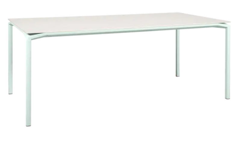 Load image into Gallery viewer, Fermob Calvi Aeris mineral dining table in Ice Mint color, 195 x 95 cm, eight-seater table with sleek surface and sturdy legs.
