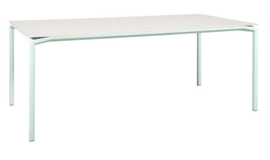 Fermob Calvi Aeris mineral dining table in Ice Mint color, 195 x 95 cm, eight-seater table with sleek surface and sturdy legs.