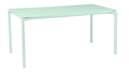 Fermob CALVI rectangular kitchen table in Ice Mint, 160x80 cm, six-seater with a modern design, shown in a dining setting.