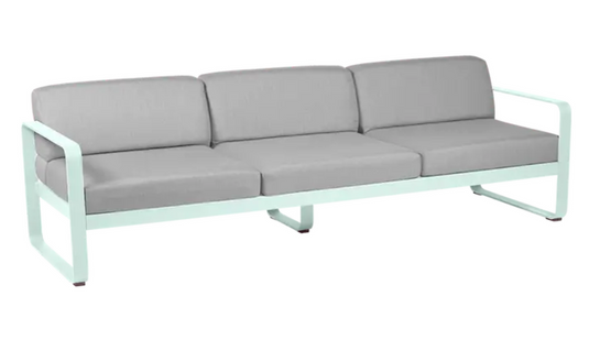 Fermob Bellevie 3-seater outdoor sofa with metal frame, grey fabric cushions, and Ice Mint flannel accents for stylish outdoor seating.