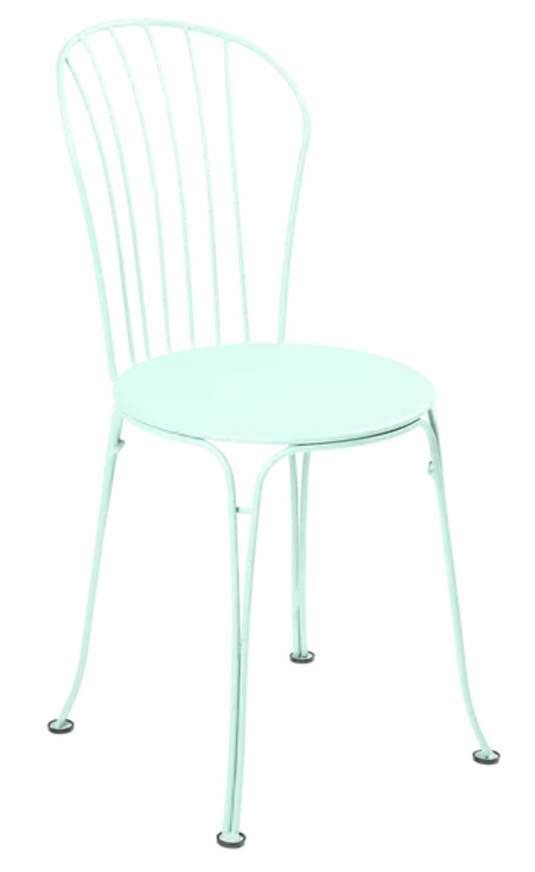 Ice Mint Fermob OPÉRA+ outdoor metal chair with sleek design, suitable for restaurant and outdoor seating areas.