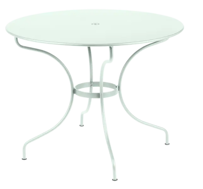Load image into Gallery viewer, Fermob OPÉRA+ outdoor metal table in Ice Mint, 96 cm diameter, ideal for five-seater patio dining.
