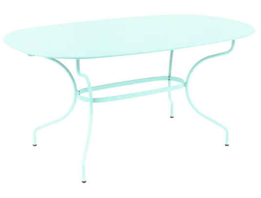 Fermob OPÉRA+ oval outdoor table in Ice Mint, 160x90 cm, six-seater with metal construction for outdoor dining and patio use.