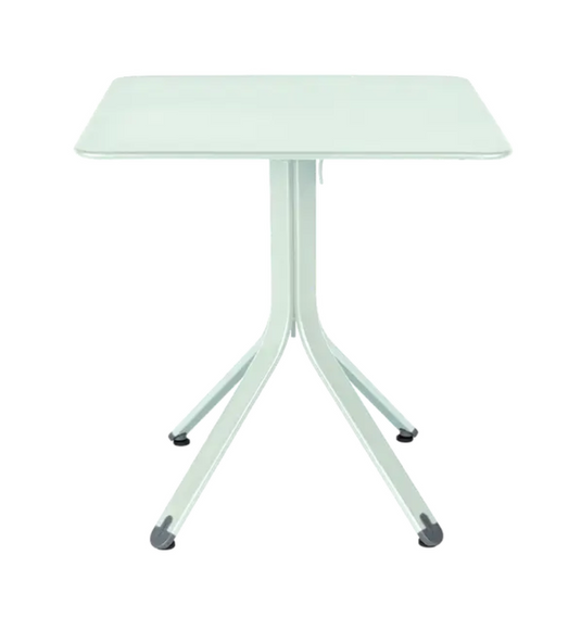 Fermob Rest'O folding outdoor table in Ice Mint color, 71x71cm metal surface with folded design for easy storage.