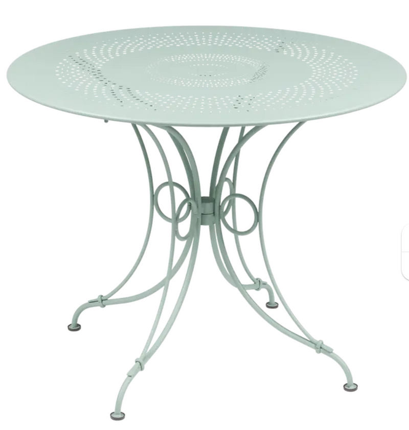 Load image into Gallery viewer, Ice Mint Fermob 1900 outdoor table with 96cm diameter, featuring a metal surface and modern design for outdoor use.
