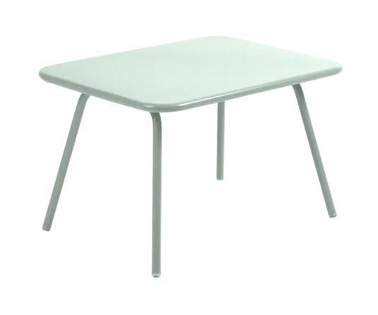 Ice mint blue Fermob Luxembourg kid's children’s table with rounded edges, suitable for play and activities in a corner setting.