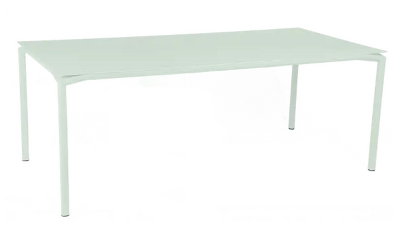 Load image into Gallery viewer, Fermob Calvi outdoor rectangular dining table in ice mint, 195 x 95 cm, suitable for eight seats, featuring modern design.
