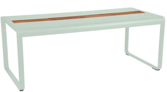 Ice mint Fermob Bellevie outdoor dining table with wood and metal design, 196 x 90 cm, eight-seater with built-in storage.