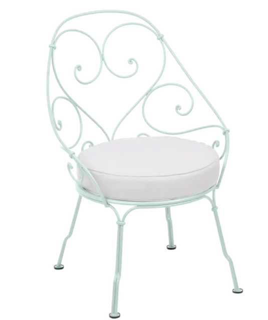 Ice Mint Fermob Cabriolet outdoor armchair with off-white metal frame, stylish and comfortable for garden or patio seating.