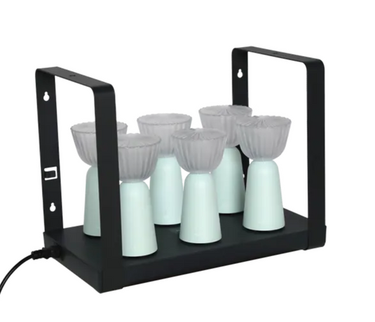 Set of six Fermob Swing lamps in ice mint color with a charging tray, rechargeable outdoor lighting for patio or garden.