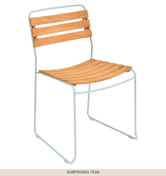 Ice mint Fermob Surprising Teak Chair, metal outdoor furniture with sleek design, suitable for garden or patio use.