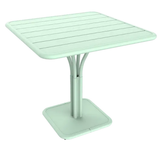 Ice Mint white Fermob Luxembourg outdoor pedestal table, 80x80 cm, showing a sleek, modern design with a round tabletop.