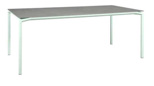 Fermob CALVI Kreta mineral dining table, 195x95cm, eight-seater with a mint-colored concrete tabletop and sturdy metal legs.