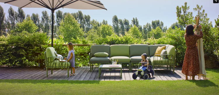 Komodo 5 modular outdoor sofa by Custom Wood Designs, showing a stylish outdoor seating arrangement with cushions and wooden frame.