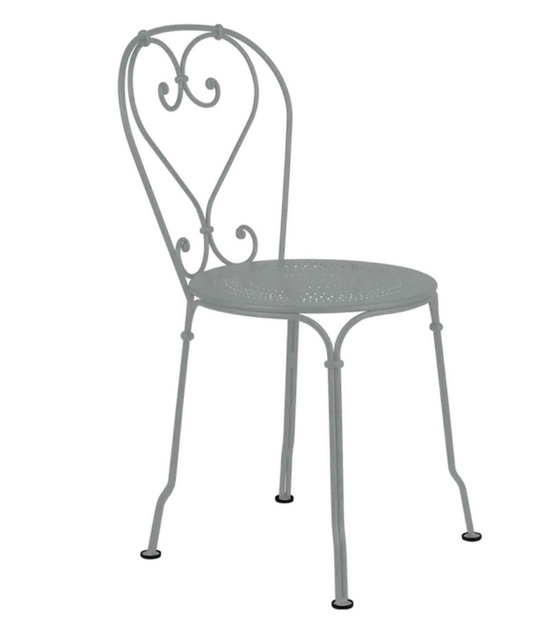Load image into Gallery viewer, Lapili Grey Fermob 1900 outdoor chair with a sleek metal frame and curved armrests, ideal for garden or patio seating.
