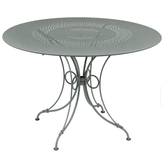Fermob outdoor 1900 round table with 117cm diameter in Lapili Grey, outdoor furniture for patio or garden.