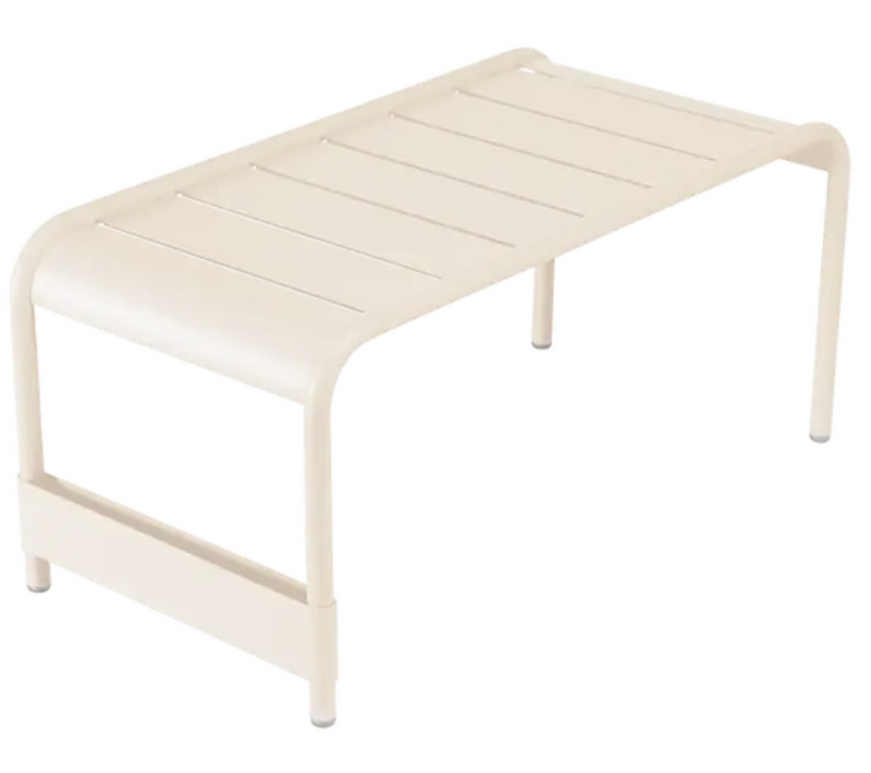Load image into Gallery viewer, Fermob Luxembourg large low table or bench in latte beige, measuring 86x44, made of durable outdoor furniture material.
