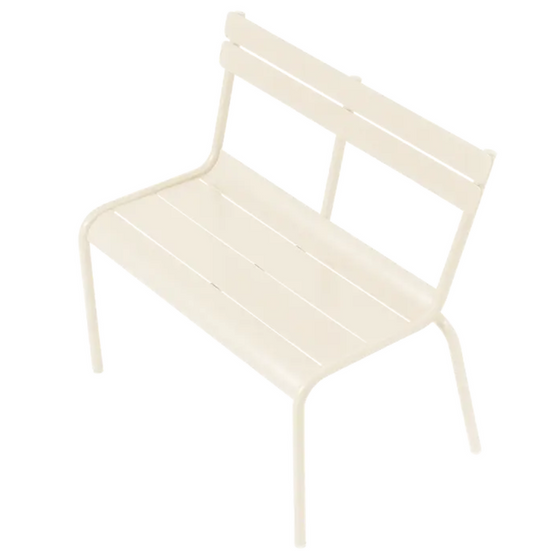 Fermob Luxembourg Kid Bench in latte beige, designed for children, made of durable outdoor restaurant furniture material.