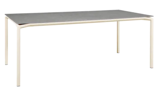 Fermob CALVI Kreta mineral dining table, 195x95 cm, eight-seater with latte-colored tabletop and sturdy metal legs.