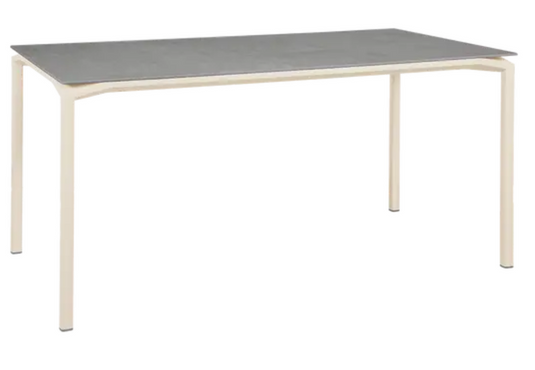 Fermob CALVI Creta mineral dining table in Latte Grey, 160x80 cm, six-seater with aeration color option.