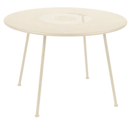 Fermob LORETTE round garden table in latte beige, 110 cm diameter, metal construction with fire-resistant finish, outdoor furniture.