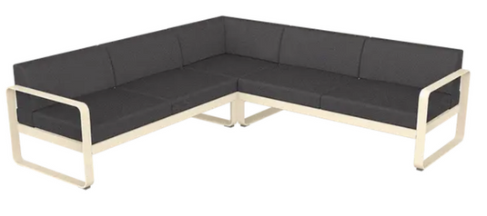 Fermob Bellevie modular outdoor lounge sofa set with latte and graphite grey cushions, showcasing a stylish outdoor seating arrangement.