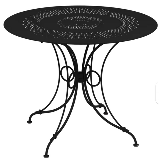Fermob 1900 outdoor table with 96cm diameter, round metal design for garden or patio outdoor furniture.