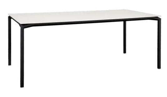 Fermob CALVI AERIS mineral dining table with eight seats, 195 x 95 cm, featuring a sleek liquorice-colored table top.