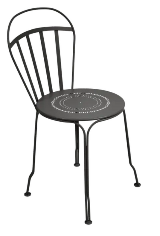 Fermob Liquorice Louvre outdoor chair with curved metal design and armrests, perfect for garden or patio seating.