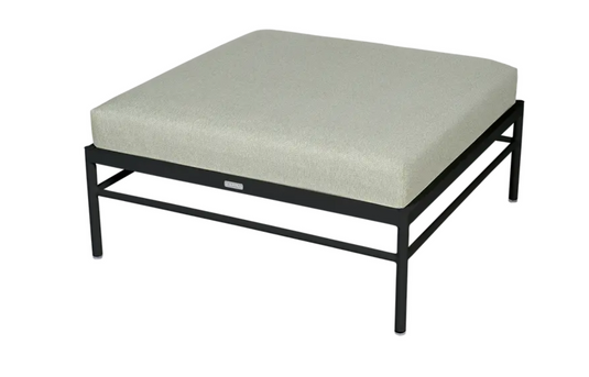 Fermob Rivage outdoor ottoman in Liquorice Meadow Green with aluminum frame, designed for garden or patio lounging.