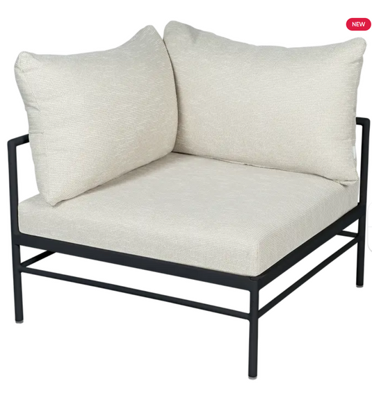 Fermob Rivage corner outdoor armchair with liquorice wicker and metal frame, designed for comfortable outdoor seating.