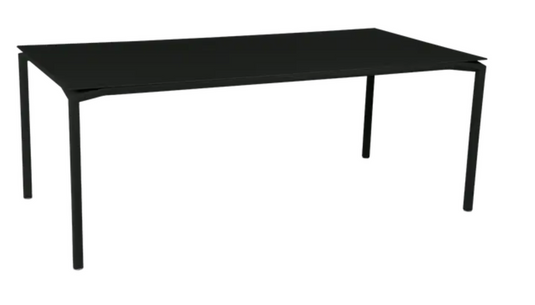 Fermob Calvi rectangular outdoor dining table, 195 x 95 cm, eight-seater with liquorice finish, suitable for outdoor and indoor use.