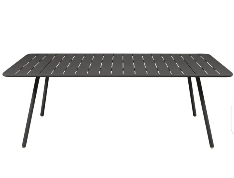 Load image into Gallery viewer, Fermob Luxembourg outdoor table in Liquorice color, 207x100 cm, designed for patio or garden seating.
