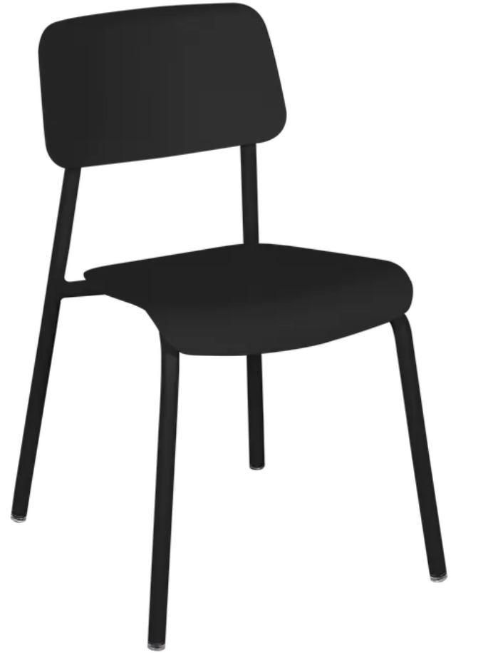 Load image into Gallery viewer, Fermob Liquorice Studie outdoor armchair with a sleek design, featuring a curved backrest and armrests, set on a patio.
