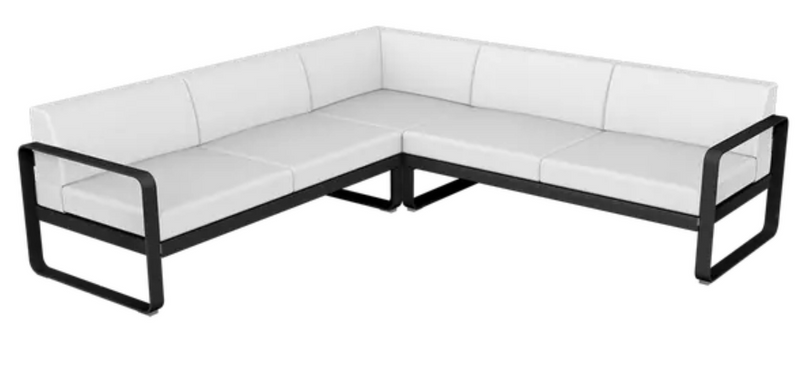 Load image into Gallery viewer, Fermob Bellevie Composition 2 outdoor lounge set with white modular sofas and liquorice-colored cushions on a patio.
